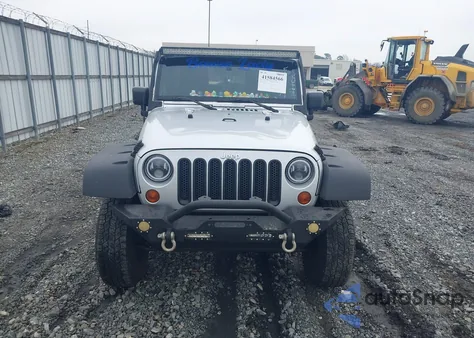 2009 Jeep Wrangler Unlimited X from USA, damaged, VIN 1J4GB391X9L761775